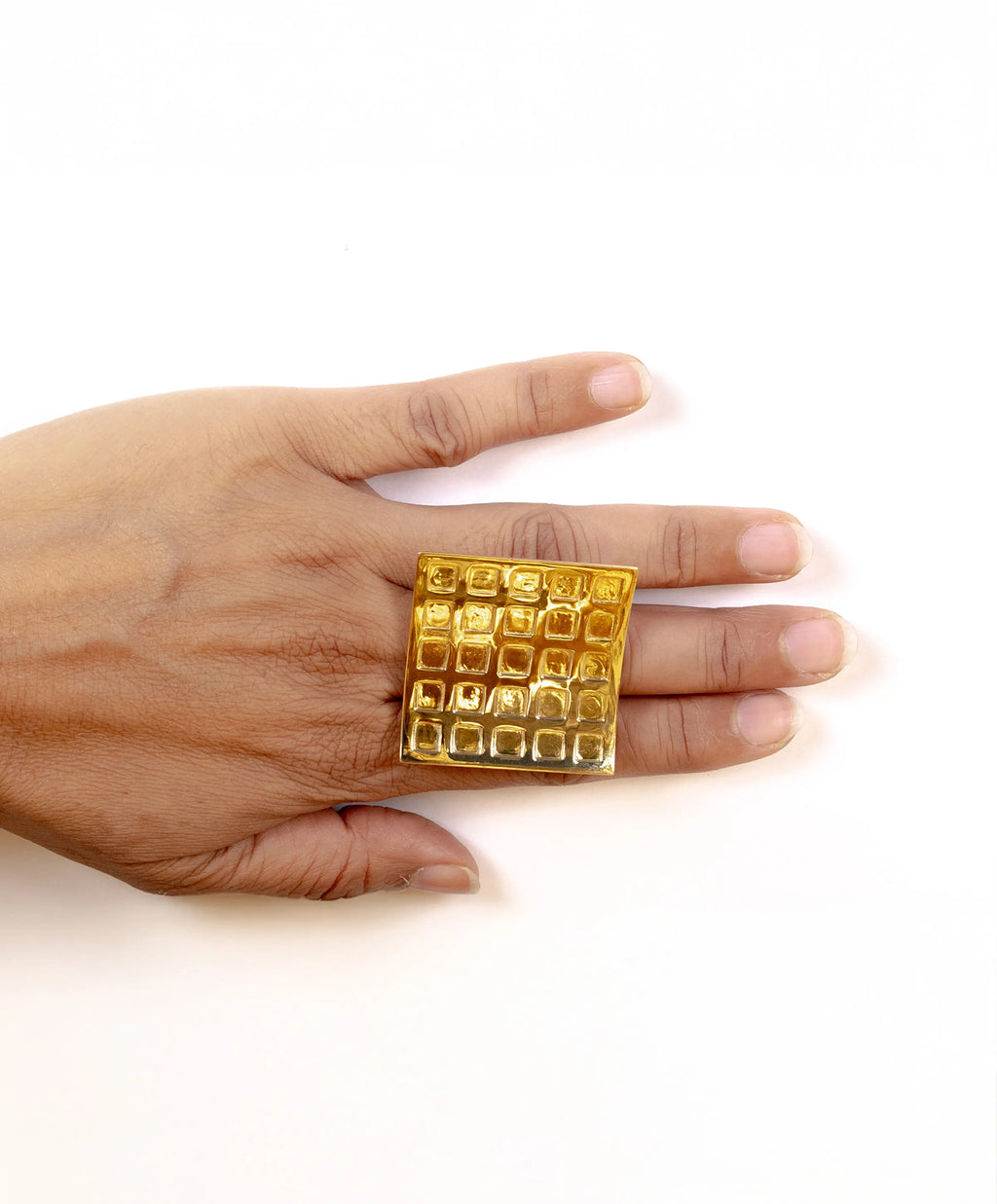 Close-up of the MAISON MEGH Kitthh Mega Ring jewelry piece featuring a bold, stylish silver ring with intricate design details.